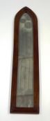 A Gothic style oak framed wall mirror,