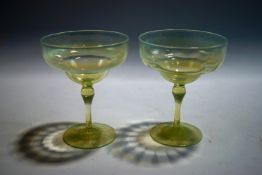 A near pair of Straw Opal champagne glasses, Whitefriars, designed by T.G.