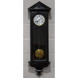A Vienna style ebonised wall clock, with single weight and pendulum,