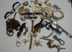 A quantity of costume jewellery and lady's wrist watches