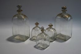 A pair of George III bottles and stoppers, each of rectangular form,