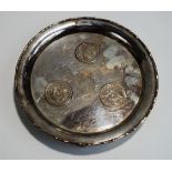 A Chinese coin set salver, stamped 'Wai Kee', Sterling Silver' and 'Made in Hong Kong',