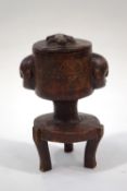 A mid 20th Century Ivory Coast Baule carved hardwood vessel and cover,