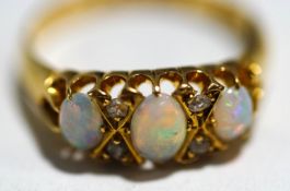 An Edwardian 18ct gold opal and diamond ring,