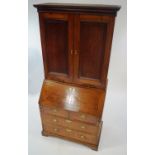 A George III mahogany bureau bookcase,