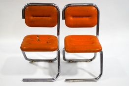 A pair of 1970's Continental chrome and vinyl chairs