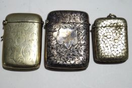 Three vesta or match safes,