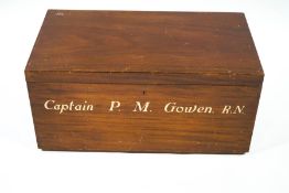 A mahogany two handled trunk, with painted name "Captain P M Gowen R,N," 37.5cm high x 79.