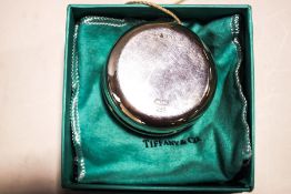 A Tiffany & Co silver yoyo, marked 'C1999 Tiffany & Co.