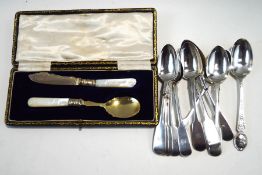 A set of five Victorian silver fiddle pattern tea spoons;