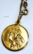 A 9 carat gold St Christopher pendant, on a 9 carat gold chain,