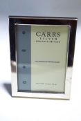 A modern silver rectangular plain photo frame by Carrs, hallmarks for Sheffield 2011, 14cm x 10.