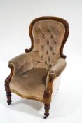 A Victorian mahogany scroll frame button back armchair,