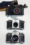 Two German Exakta Varex cameras, one without a lens,