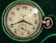 An Art Deco period Tavannes pocket watch in a tooled leather case