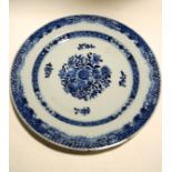 A Chinese plate, decorated in underglaze blue,