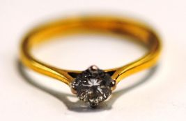 A single stone diamond 18 carat gold ring, the brilliant cut of approximately 0.