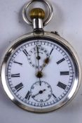 A silver open faced pocket watch with stop watch action, 1927 London import marks,
