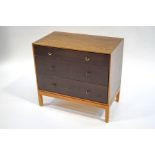 A Stag chest of three long drawers, with brass loop handles,