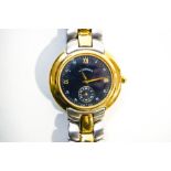 Giorgio, a gentleman's stainless steel and gilt bracelet watch, the black dial with Roman quarters,