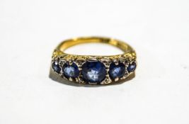 An 18 carat gold five stone sapphire ring,