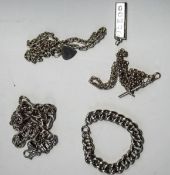 A silver bracelet, of solid curb links; a silver 1977 ingot; and three silver chains; 184 g (5.