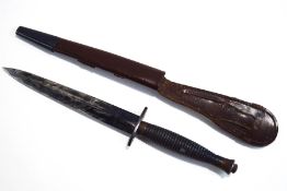 A WWI Continental dagger in leather sheath