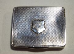 An Asprey silver engine turned rectangular vesta/match case in the form of a snuff box,