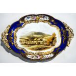 A 19th Century English dessert dish, the central panel with hand painted view of Wrekin, Salop,