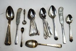 A set of six tea spoons marked 'Sterling', a set of six silver coffee spoons, Birmingham 1936,