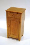 A Victorian pine pot cupboard with single drawer and turned handles,