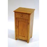 A Victorian pine pot cupboard with single drawer and turned handles,