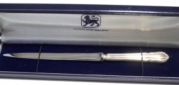 A silver paper knife or letter opener, the dubarry pattern handle with hallmarks for Sheffield 2001,