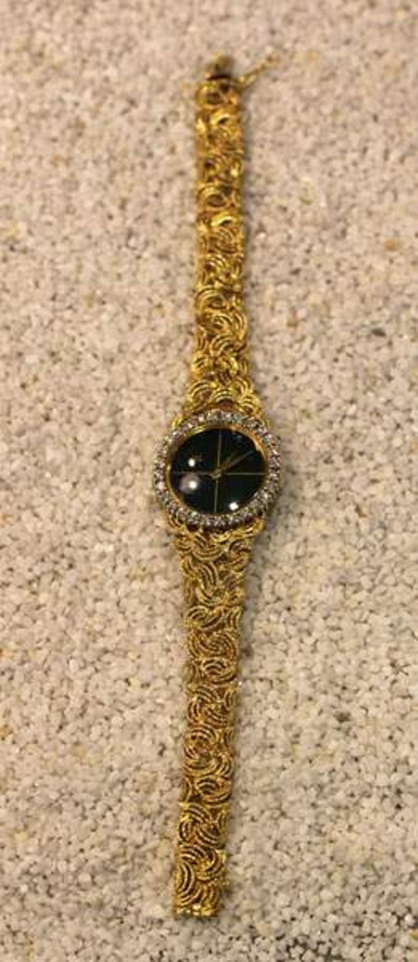 18 k Gelbgold Damen-Armbanduhr der Firma Lotos, dekoratives Goldarmband, Lunette mit Diamantkranz,