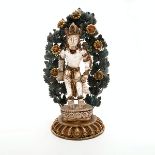 A Rock Crystal and Metal Bodhisattva The figure carved from rock crystal and shown standing upon a