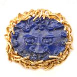 Asian Lapis Lazuli, 14k Yellow Gold Beast Brooch. Designed as a beast featuring a carved lapis