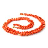 *Coral, 14k Yellow Gold Necklace. Composed of one hundred and thirty-two varying shaped carved coral