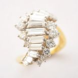 Diamond, 18k Yellow Gold Ring. Featuring twelve baguette-cut diamonds weighing a total of