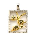 Diamond, 18k Yellow & White Gold Pendant. Featuring forty-three full-cut diamonds weighing a total