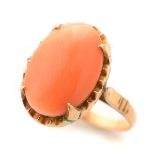 *Coral, 14k Yellow Gold Ring. Featuring one oval coral cabochon measuring approximately 15.38 x 10.