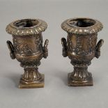 Pair of Neoclassical Style Patinated Bronze Urns with Handles