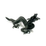 A Japanese Bronze Dragon The sinuous three-clawed dragon shown with an open mouth issuing a