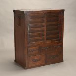 A Japanese Kitchen Tansu (Mizuya) Designed with sliding doors above fiver small drawers,