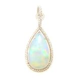 Opal, Diamond, 14k White Gold Pendant. Featuring one pear shaped opal cabochon measuring