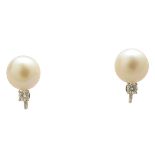 Pair of Cultured Pearl, Diamond, White Gold Earrings. Each featuring one round cultured pearl