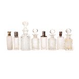 Eight Cut Glass Scent or Perfume Bottles, Including four with silver lids, one Gorham sterling