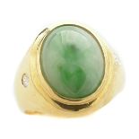 Jade, Diamond, 18k Yellow Gold Ring. Centering one oval jadeite cabochon measuring approximately