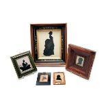 Collection of Five Framed Silhouettes, Including two reverse painted on glass of gentlemen, one