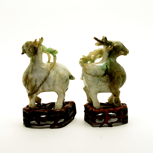 A Pair of Jadeite Figures of Deer Carved in mirror image with each deer grasping a lingzhi branch in - Image 3 of 9