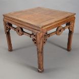 A Square Game Table Decorated with openwork aprons.